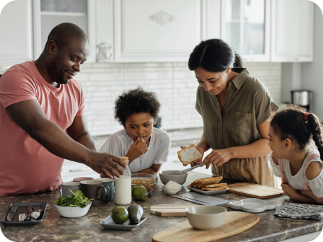 Family preparing breakfast together